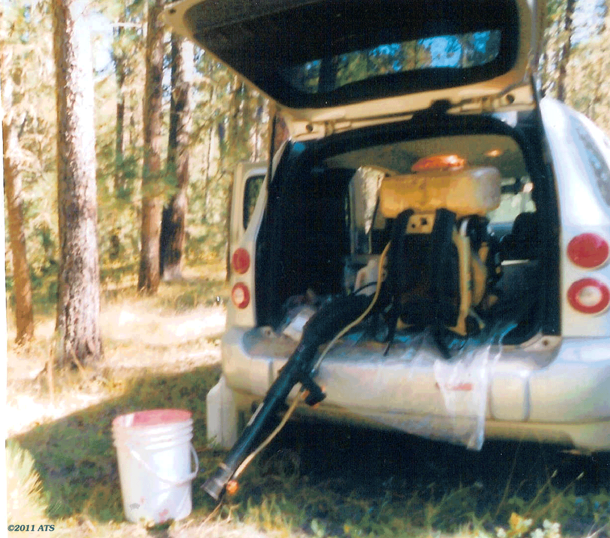 Fig. 4: Rented Chevy HHR cruiser loaded with gear at an unobtrusive location on the Black Hills National Forest.